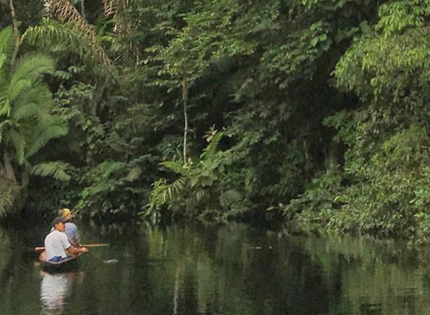 Two people in a canoe on Zabalo river in Ecuador