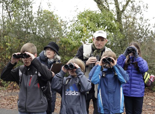 Tom Rusert with a young birder group